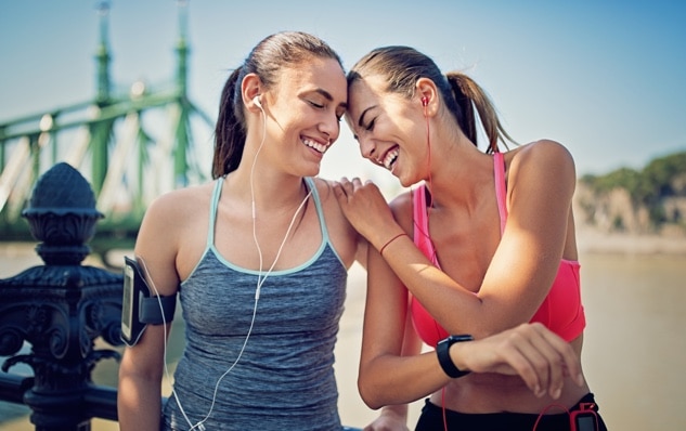 happy young women with white and clean teeth from brushing and flossing