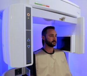 Patient undergoing dental imaging scan procedure
