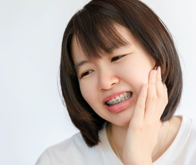 Woman with an orthodontic emergency